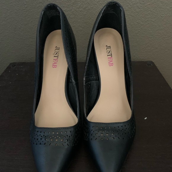 Black stilettos with a fun design around the rim. Have only been worn twice. - Picture 2 of 5